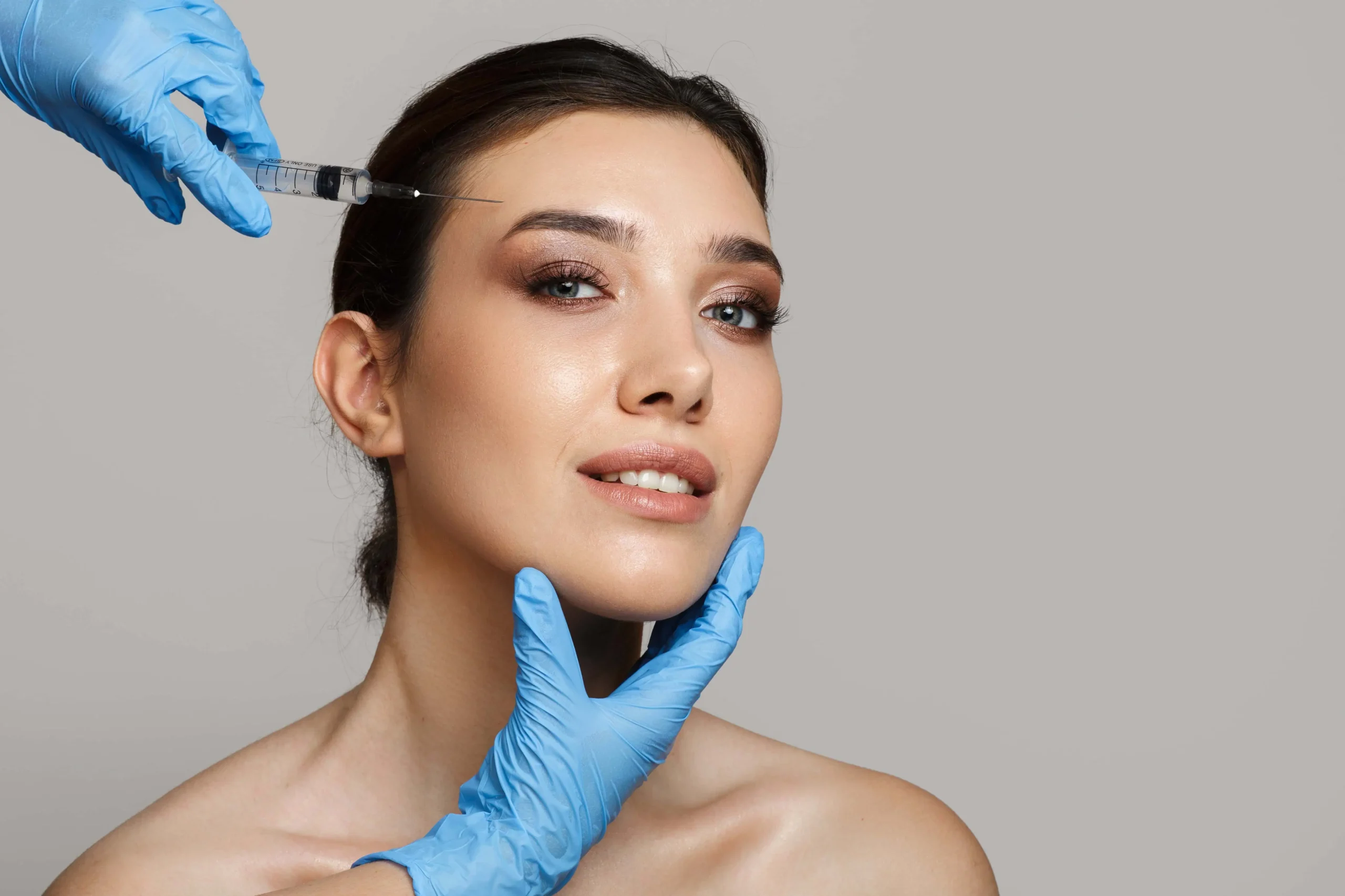 a woman getting botox injection at Park Ave Cosmetic Center